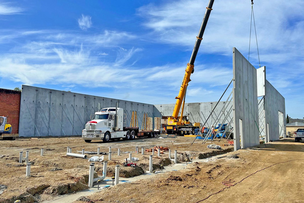 Precast panels being lifted into place